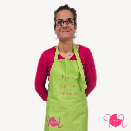 Green apron "J'peux pas, j'ai Pâtisserie" close-up